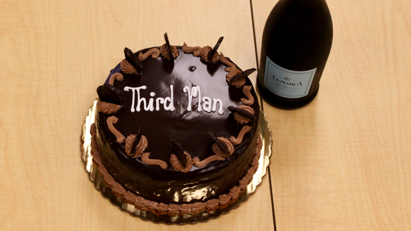 A Sacher Torte with the words "Third Man" written in icing on the top