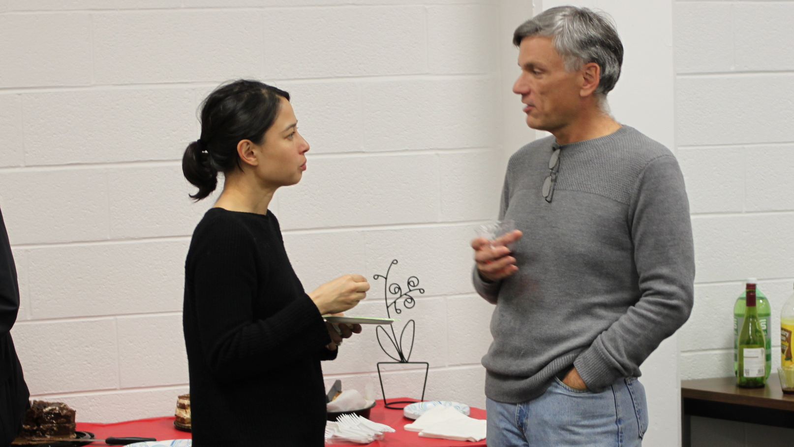 Professors Valentine Hacquard and Paul Pietroski talking during a break