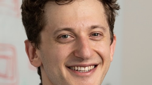 A close portrait of a young man.