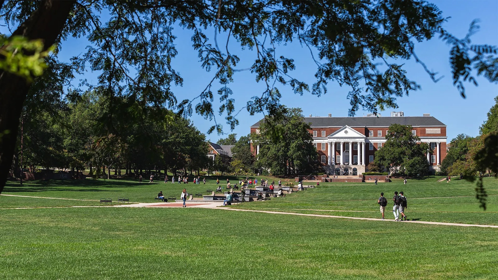 Photos of students walking by John T. Consoli.